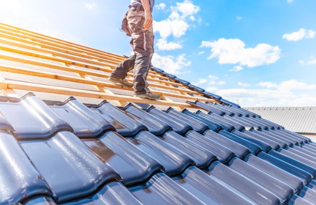 Roofing Guys Brisbane installing new terracotta roof tiles as part of a full roof repair and restoration in Brisbane. Roofing Guys Brisbane installing new terracotta roof tiles as part of a full roof repair and restoration in Brisbane.