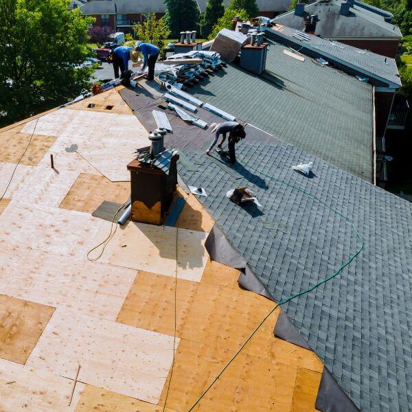 Roofing Guys Brisbane team mid-way through a full roof repair and re-sheeting project in Brisbane, replacing damaged structure and laying new shingles for long-term protection. Roofing Guys Brisbane team mid-way through a full roof repair and re-sheeting project in Brisbane, replacing damaged structure and laying new shingles for long-term protection.