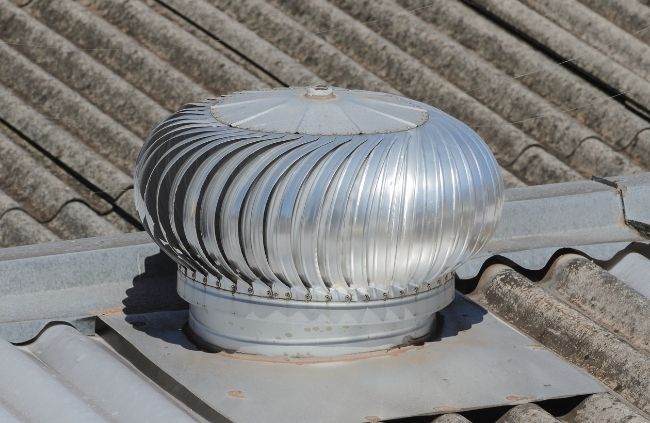 Roofing Guys Brisbane whirlybird installation on a tiled roof to improve airflow, reduce heat and prevent moisture build-up.