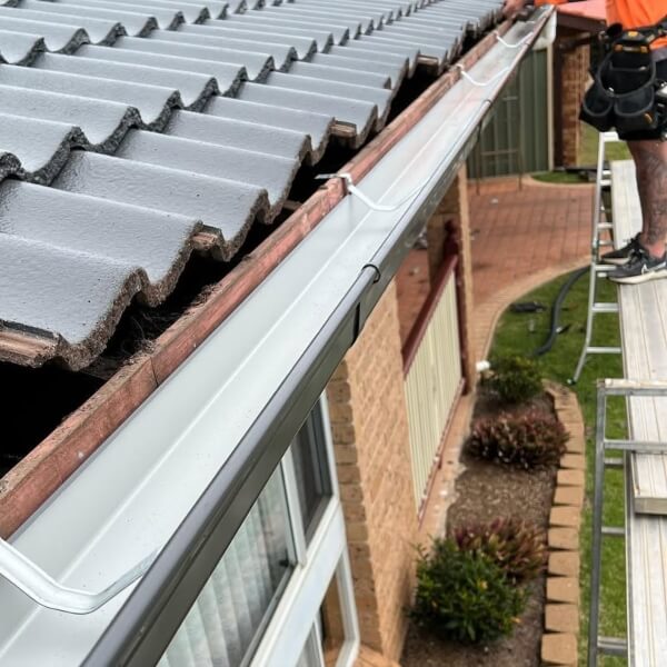 Reliable gutter installation by Roofing Guys Brisbane. Fits new guttering to tiled roofs to improve drainage and protect your home from water damage.